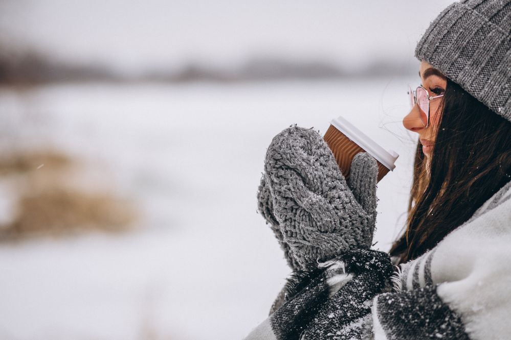 portrait-young-woman-drinking-coffee-winter-park.jpg