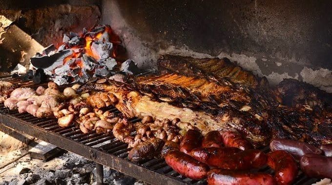 parrilla-filled-with-meat-at-argentine-asado.jpg