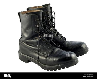 a-pair-of-worn-black-british-army-issue-combat-boots-BWJN2H.jpg